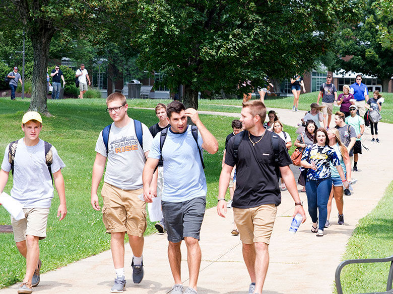 Students walking on campus.