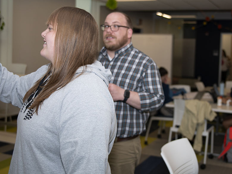 Steve working with a student in the center.