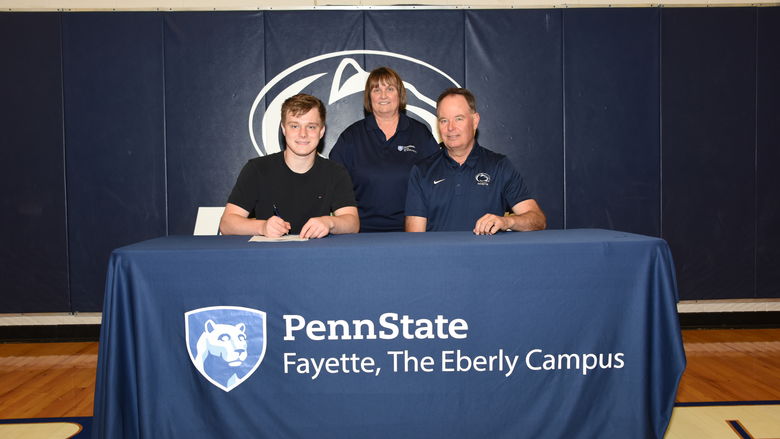 Josh Sterbutzel; Rita Gumbert, Volunteer Golf Coach; Dave Gumbert, Head Golf Coach.