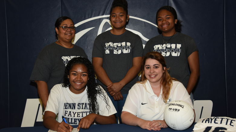 From left to right: Adi Buwawa, mother; Angel Buwawa; Bella Buwawa, sister; Samantha Swetz, Volleyball Head Coach; Emily Buwawa, sister.